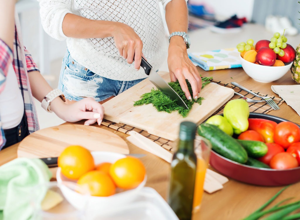 Woman cooking vegetables