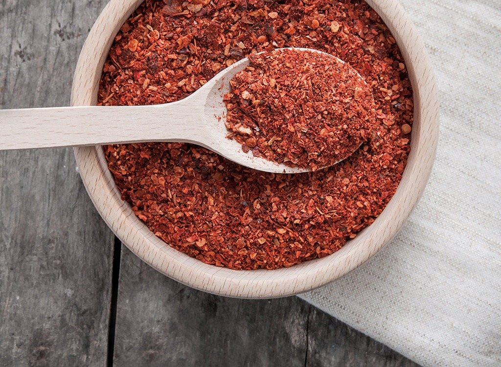 Chili spice in wooden bowl