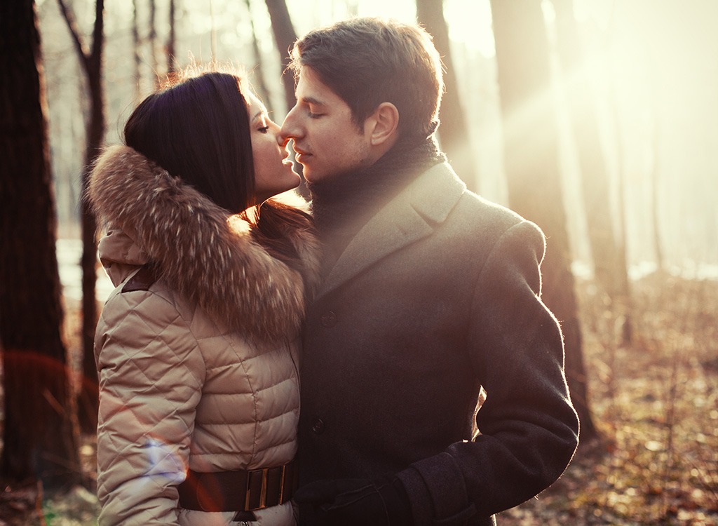 Couple kissing winter romance.jpg