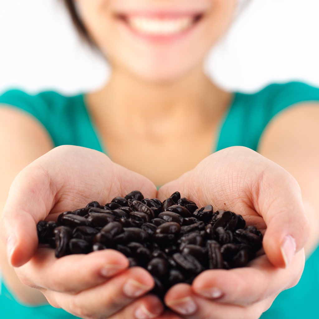 Woman coffee beans.jpg