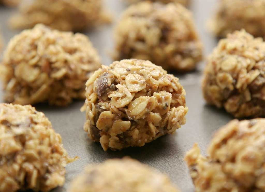 Oat energy balls on cookie sheet