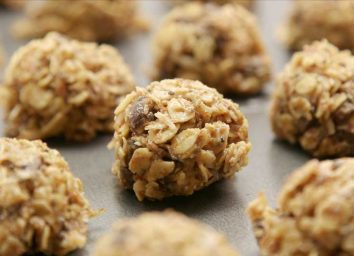 Oat energy balls on cookie sheet