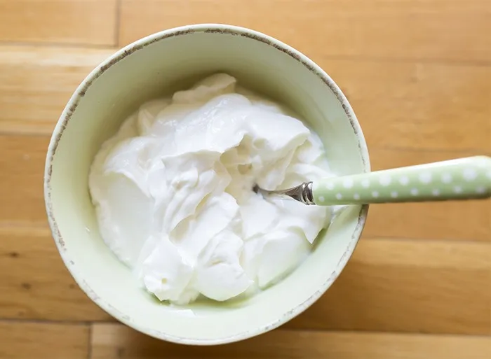 Greek yogurt in green bowl