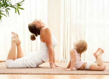 Mother and child doing yoga