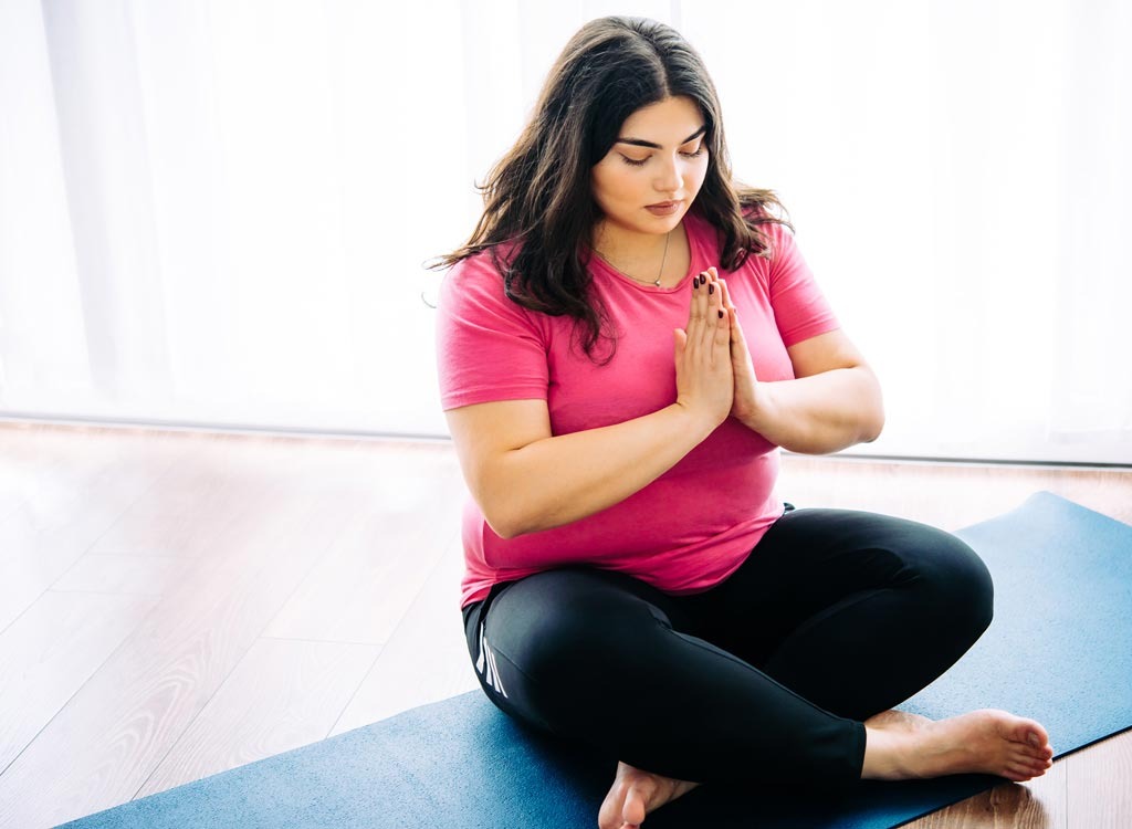 woman practicing yoga