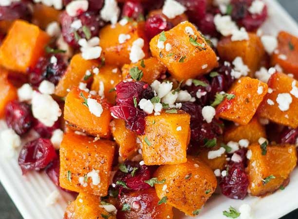 Diced butternut squash with cranberries and goat cheese