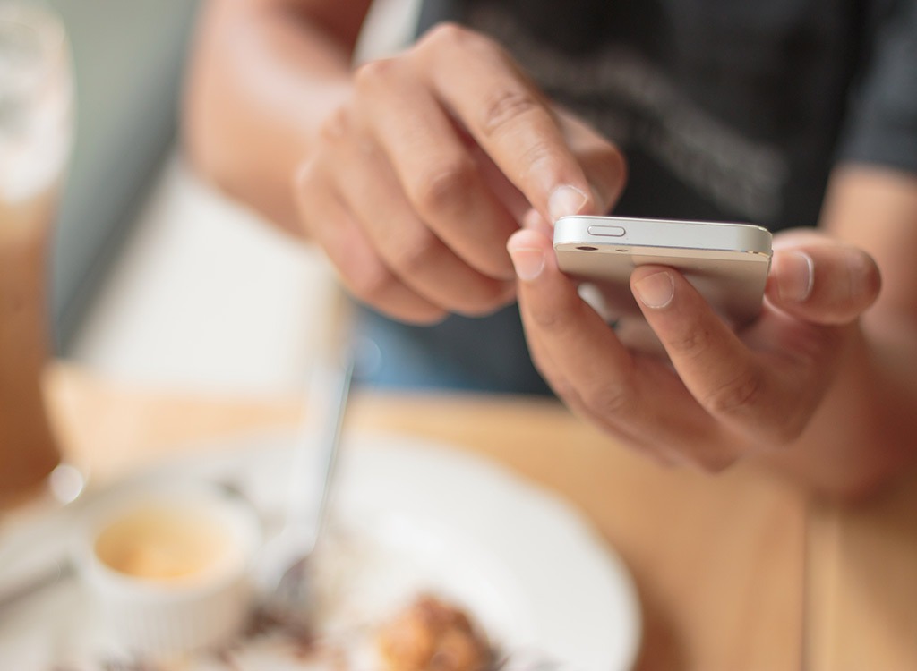 Man logging food on phone.jpg