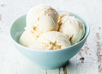 Vanilla ice cream in blue bowl