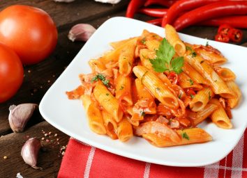 Penne pasta on white plate