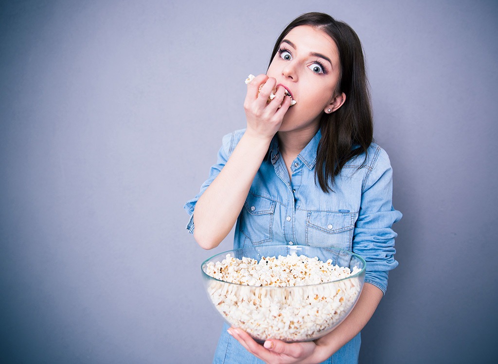 Woman eating popcorn.jpg
