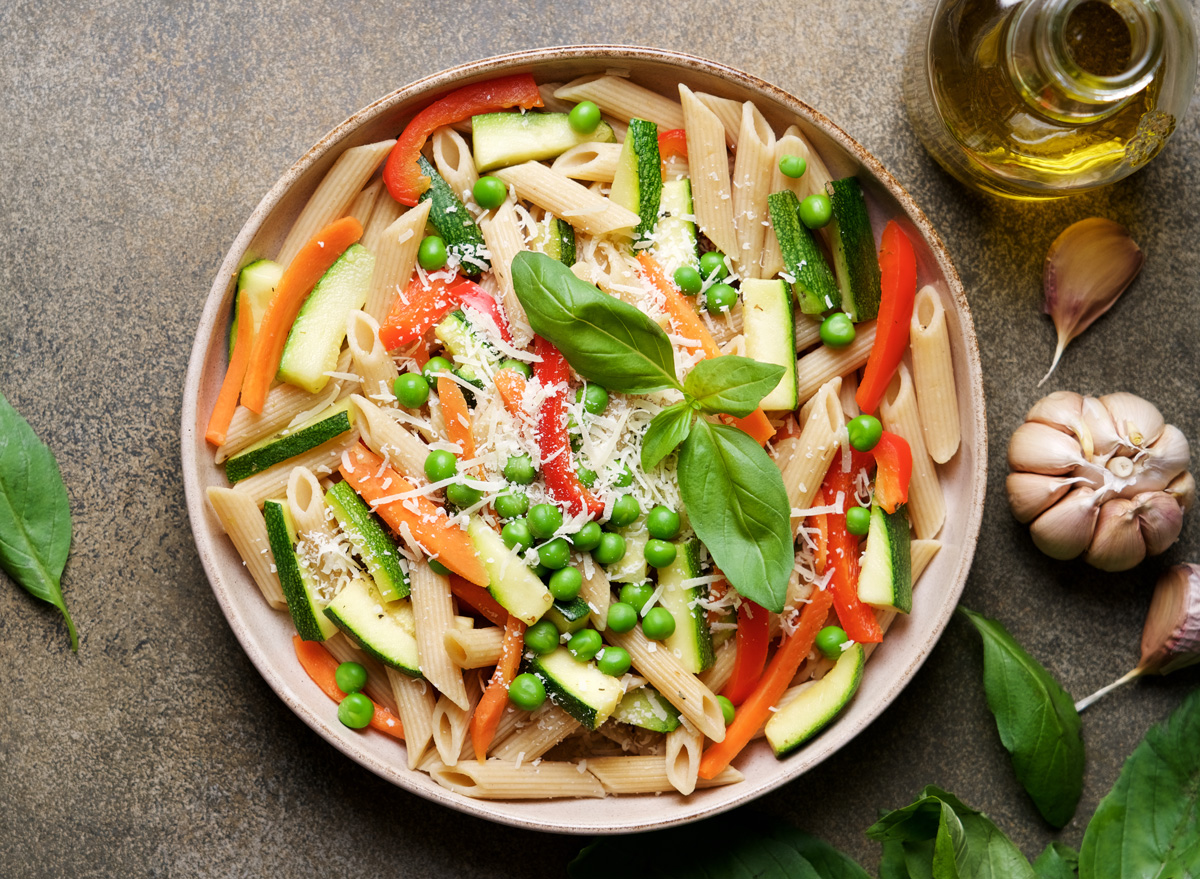 vegetable pasta primavera with carrots zucchini peppers peas
