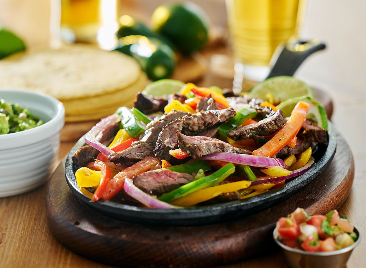 steak fajitas in a skillet