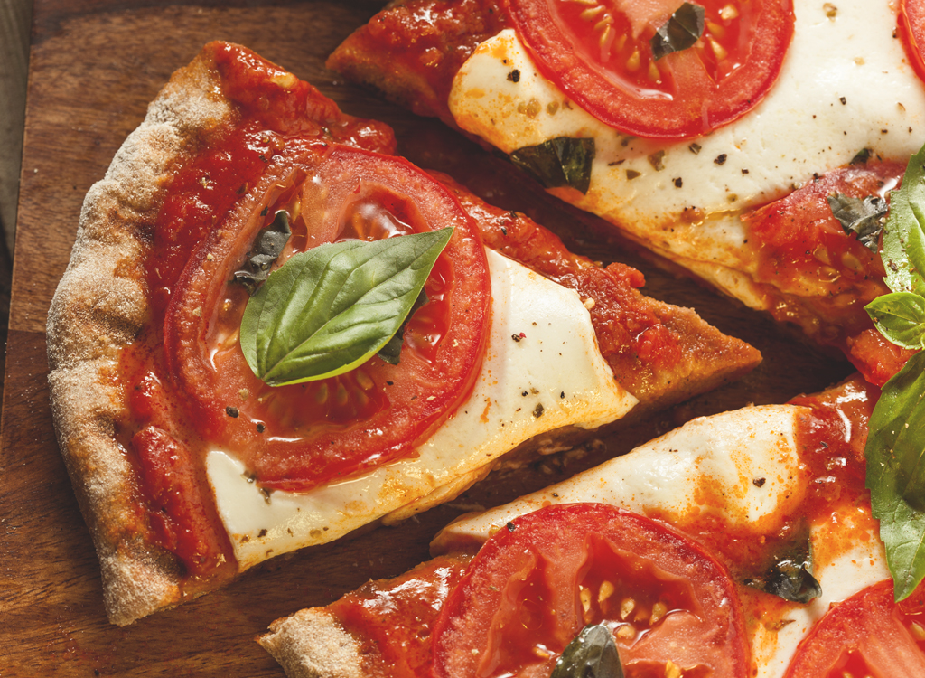 Fresh tomato slices margherita pizza