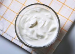 Greek yogurt on checkered place setting