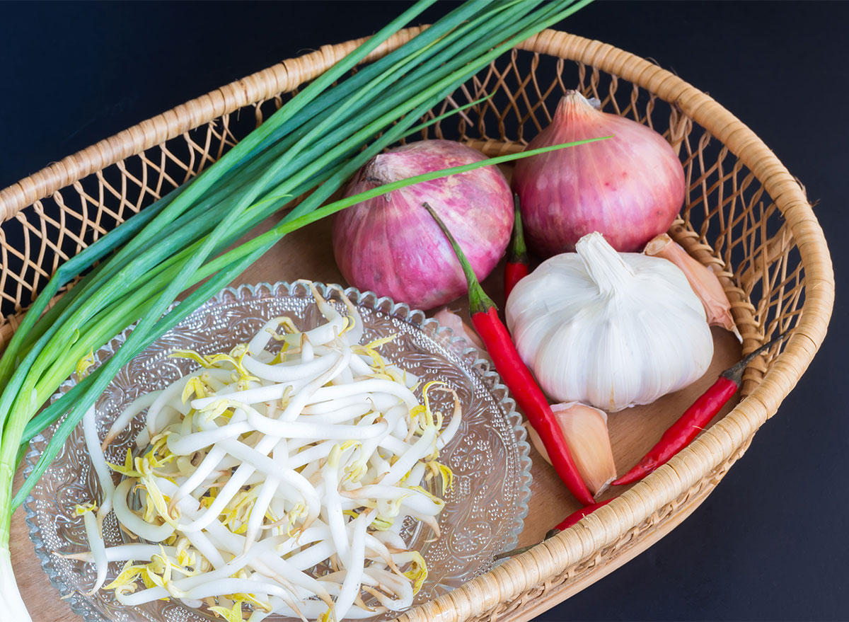 chives and garlic and bean sprouts in wicker basket