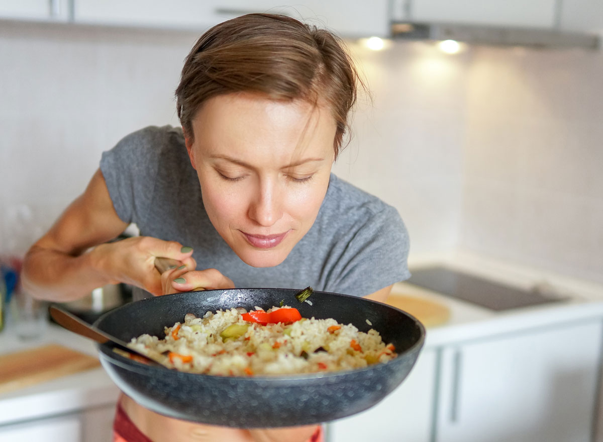 Woman smelling dinner