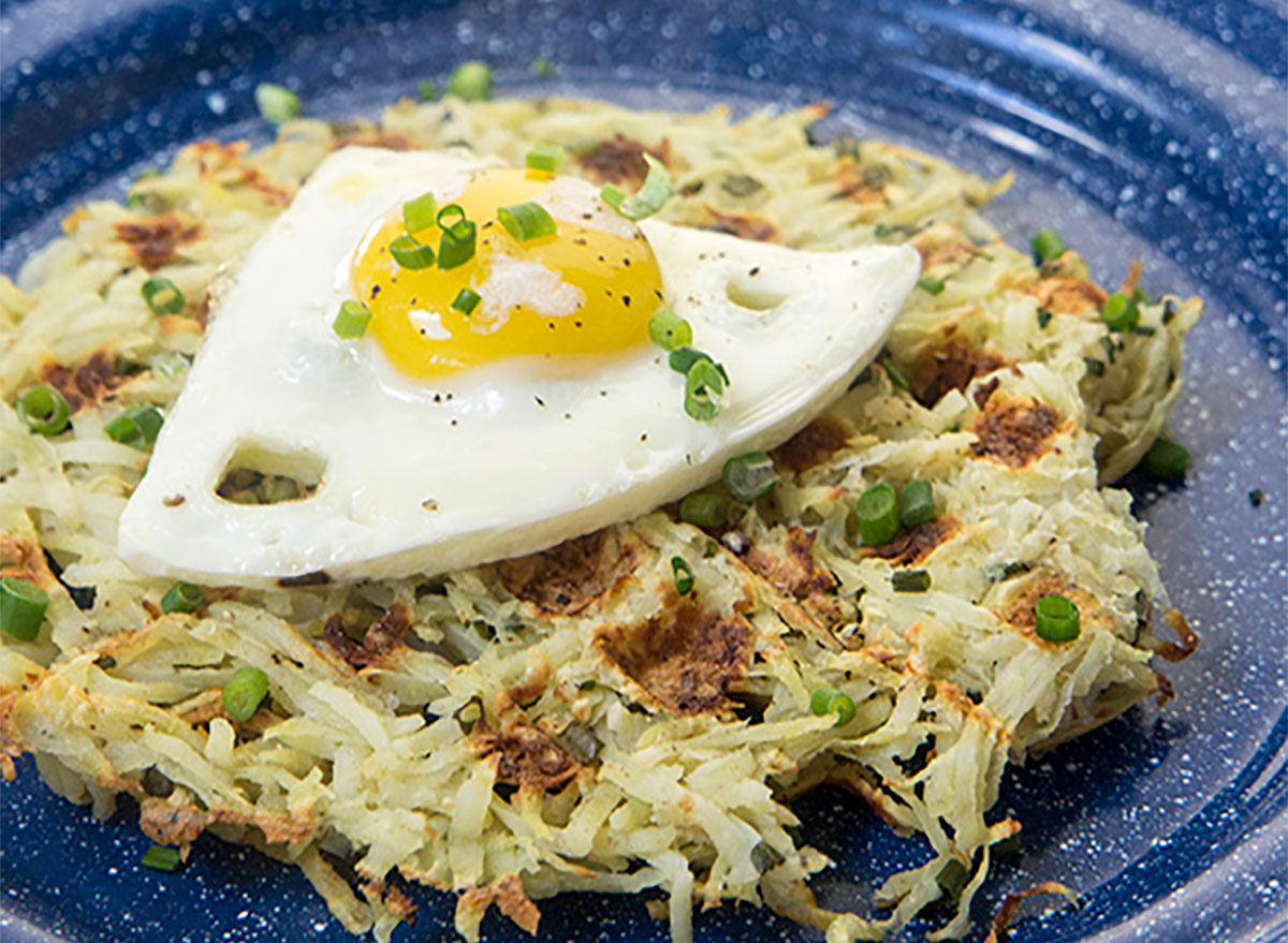 sweet potato and chive hash brown waffles topped with egg