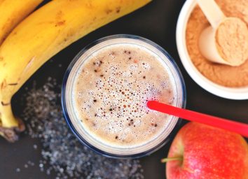 High protein banana apple smoothie with scoop protein powder