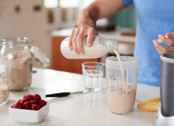 Make a protein shake smoothie with hand held blender