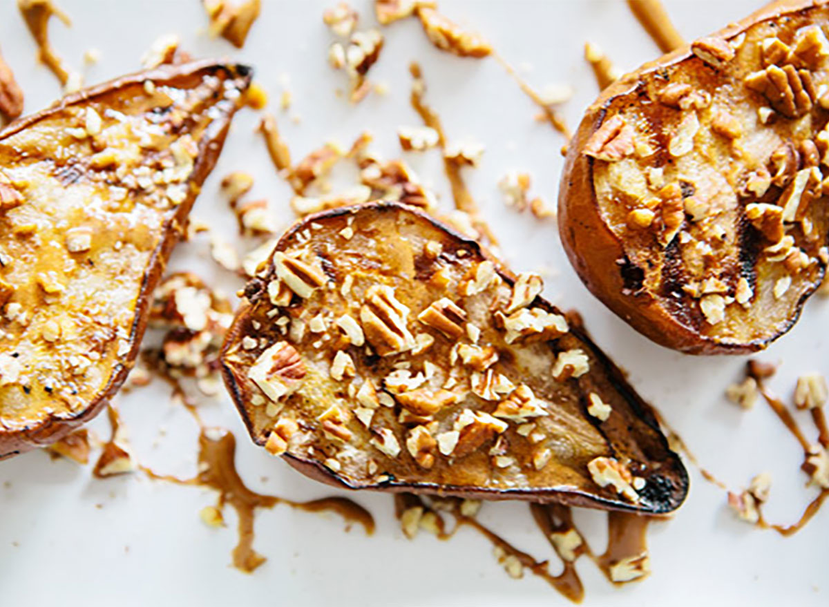 grilled pears topped with cinnamon and nuts