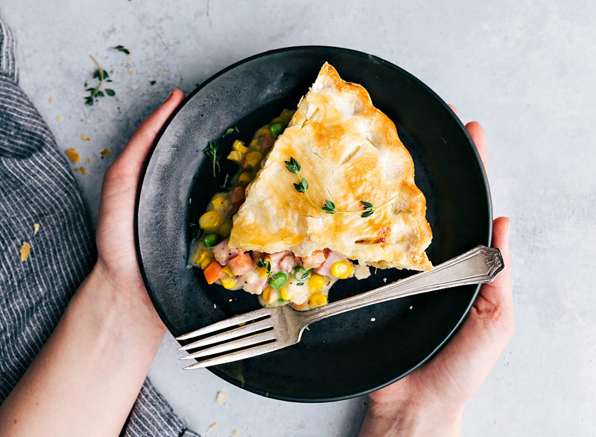 ham pot pie slice on black plate