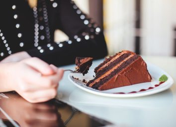 Woman eating chocolate cake