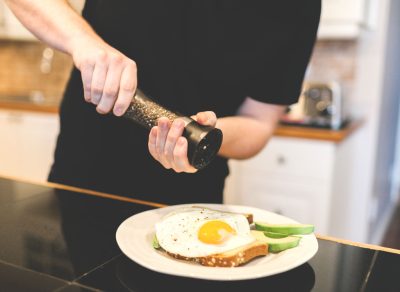 Man grinding pepper