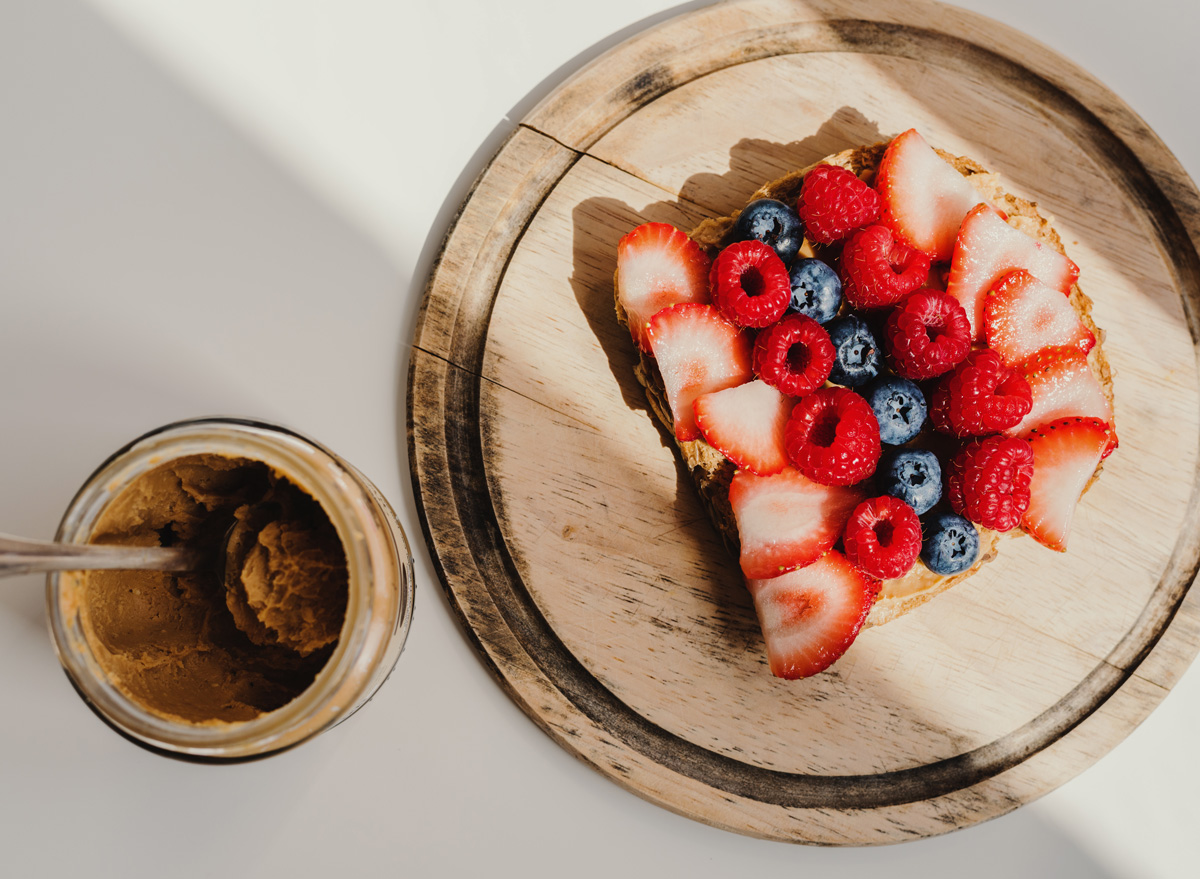 Fruit raspberry strawberry blueberry peanut butter toast