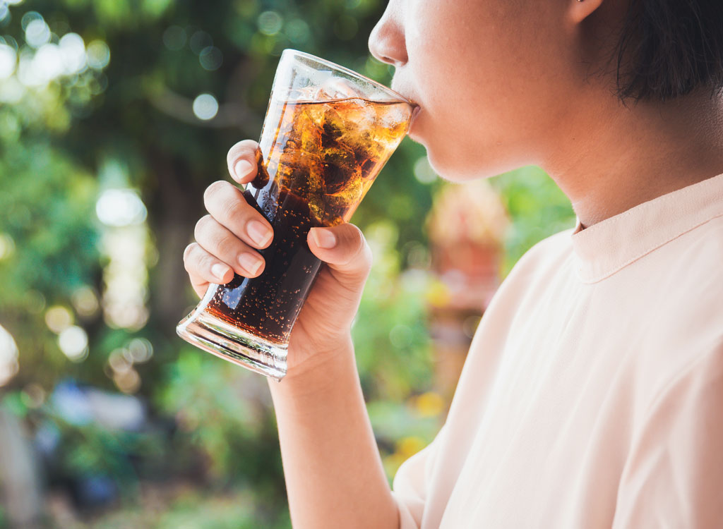 Woman drinking soda