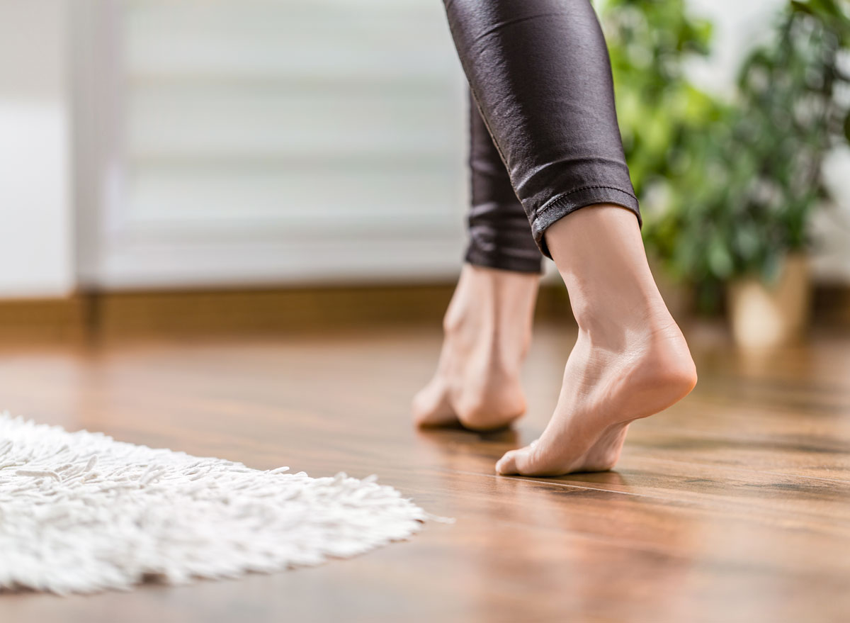 woman walking around the house