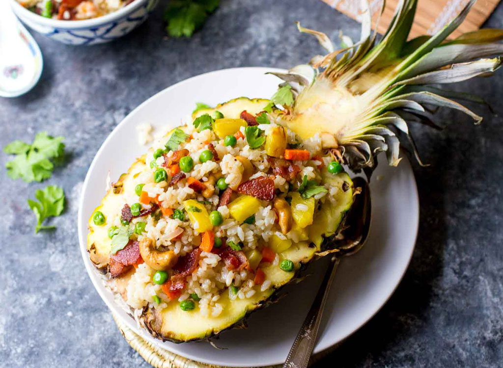 https://www.eatthis.com/wp-content/uploads/sites/4/2017/12/Pineapple-Fried-Rice.jpg?quality=82&strip=1