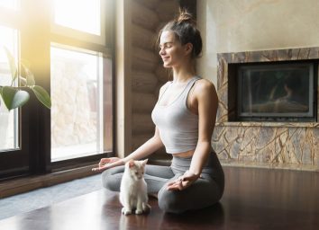 Woman cat yoga