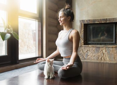 Woman cat yoga