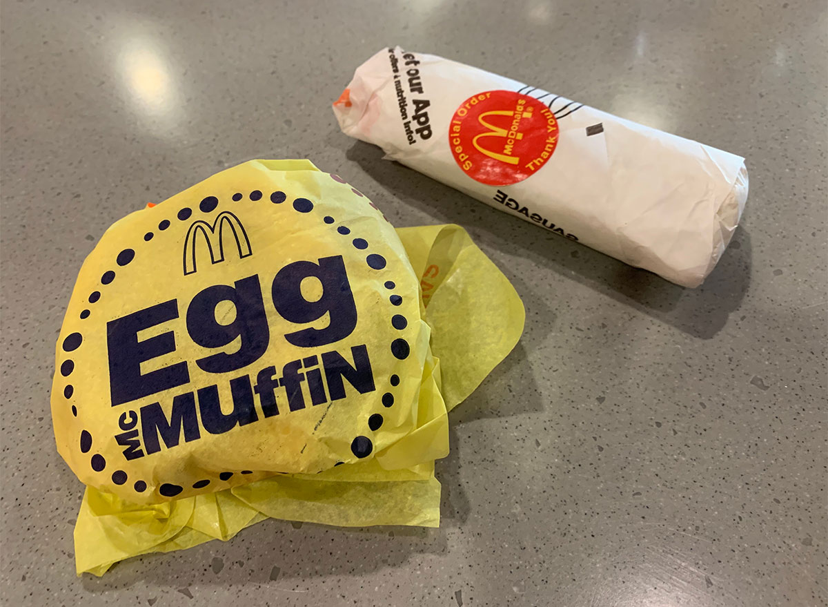 mcdonalds egg mcmuffin and breakfast burrito in wrappers