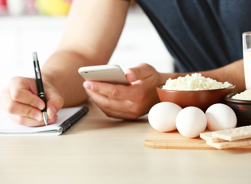 Man counting calories