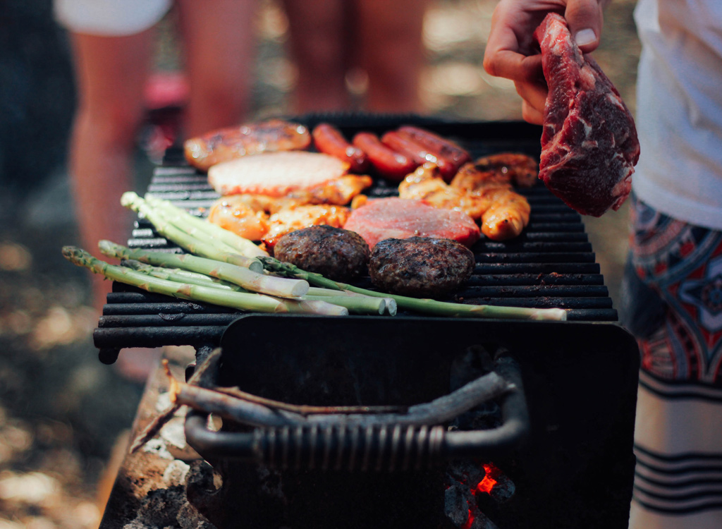 Meat and vegetables on grill