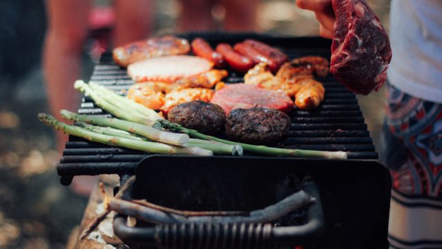 Meat and vegetables on grill