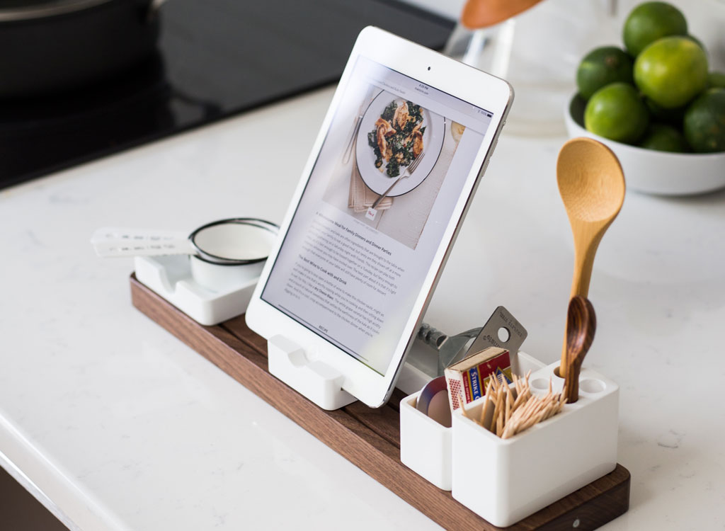 Tablet propped up on kitchen counter with recipe to follow as you cook at home