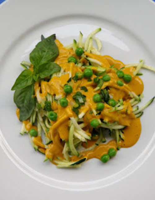 Raw zoodles with carrot cashew cream sauce