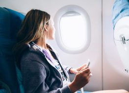 Woman sitting in an airplane