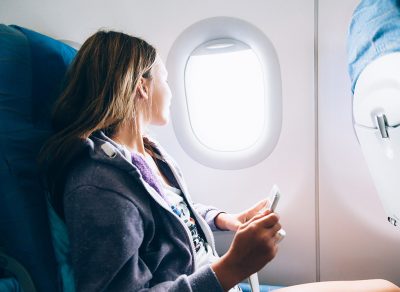 Woman sitting in an airplane