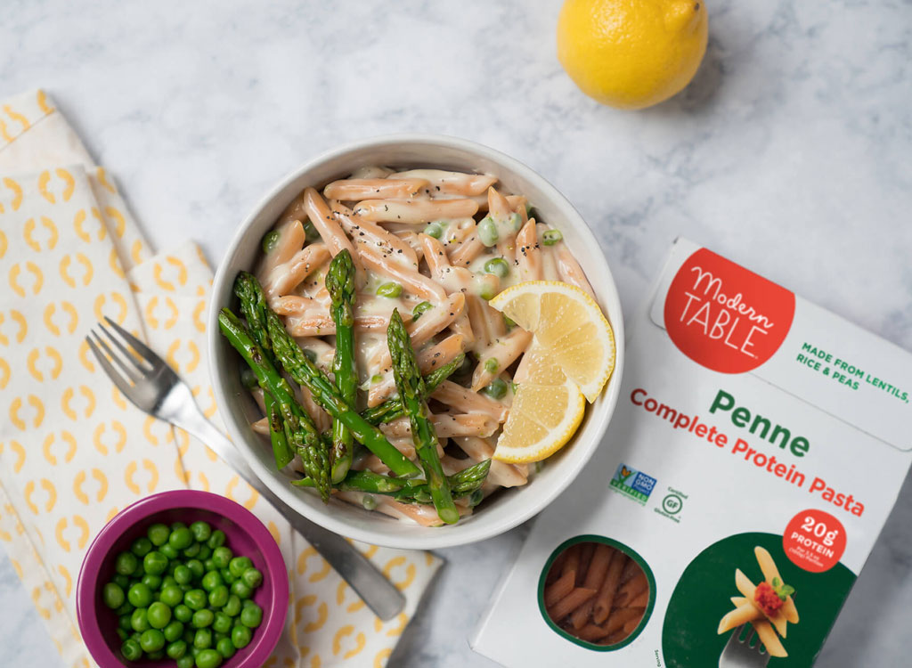 Modern table lentil creamy lemon penne peas asparagus