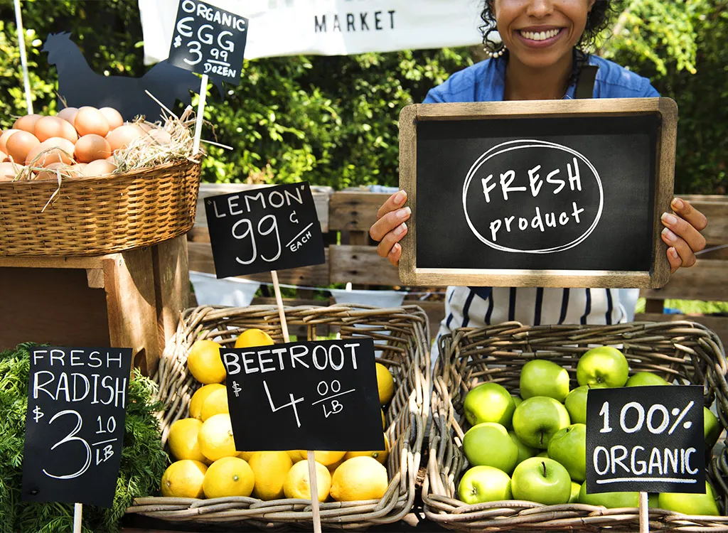 woman smiling at farmers market