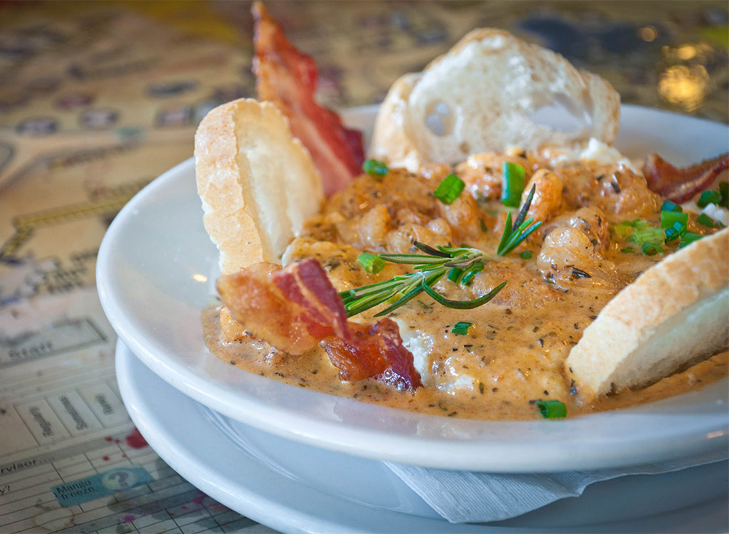 shrimp and grits in bowl with bread