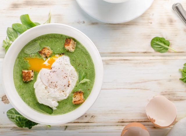 Veggie soup with poached egg