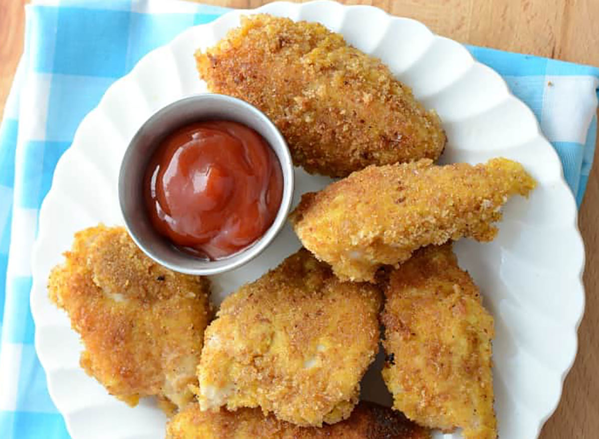 plate of homemade chicken nuggets with ketchup