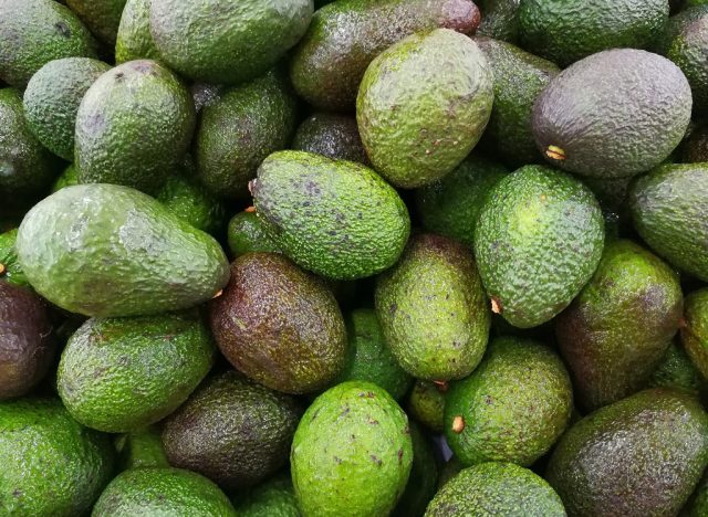 Avocados at different stages of ripeness