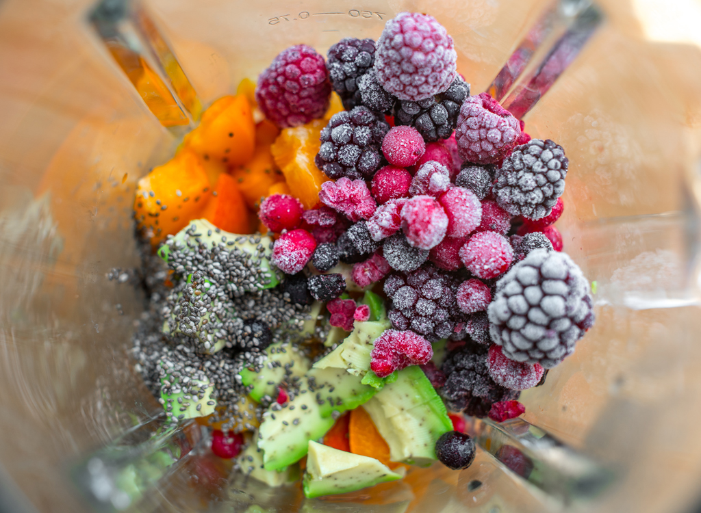 Avocado berries chia seeds in blender for smoothie