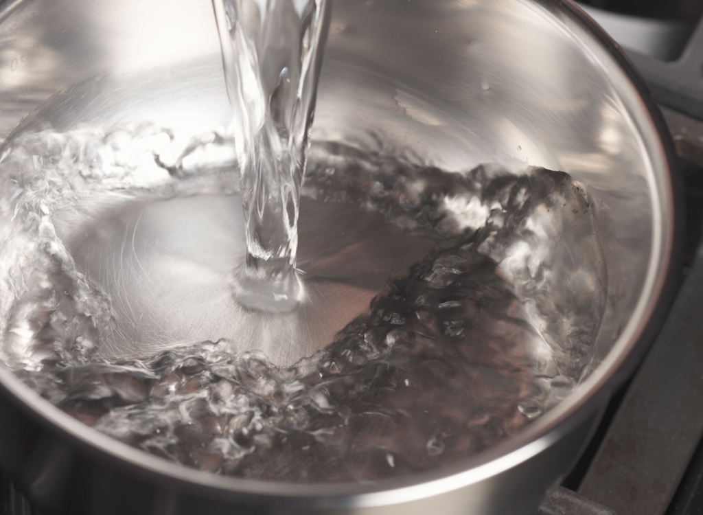 Pour water into pan