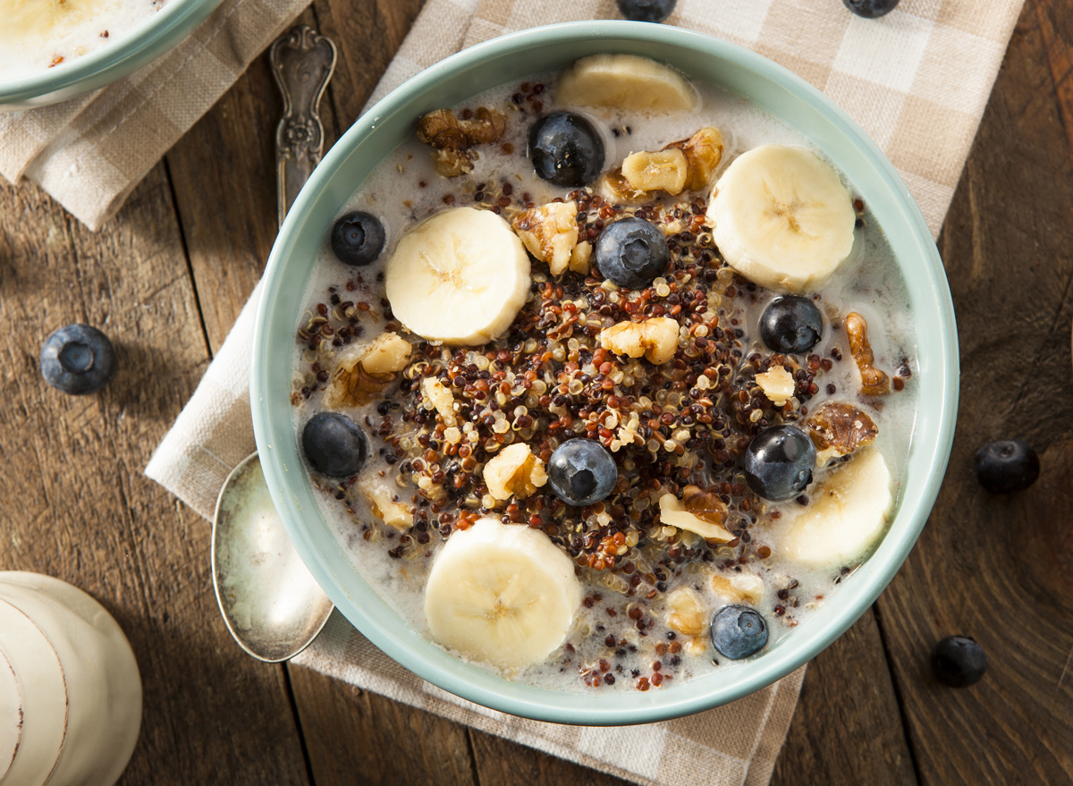 Breakfast quinoa bowl with bananas and blueberries